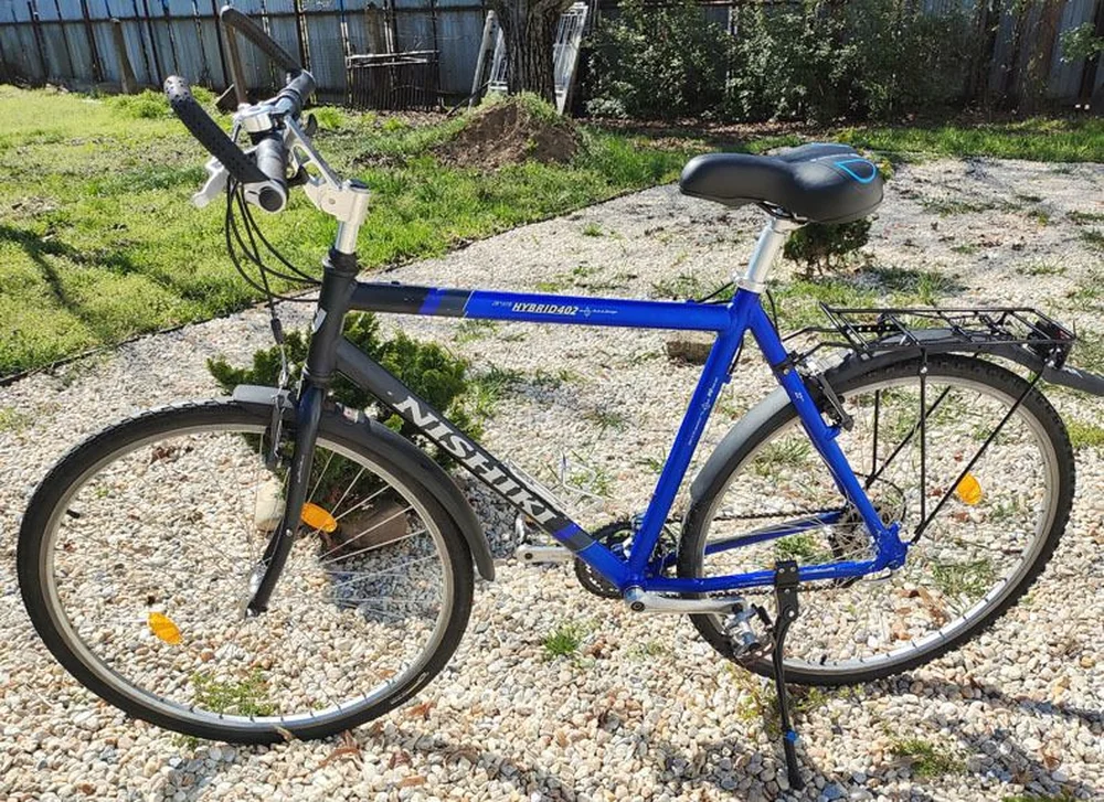 Zachovalý pánsky cestný trekingový bicykel NISHIKI HYBRID 402 ľahký 22" ALUMINIUM rám 3x8 prevodov SHIMANO